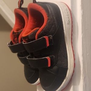 Kids black and red Reebok sneakers
